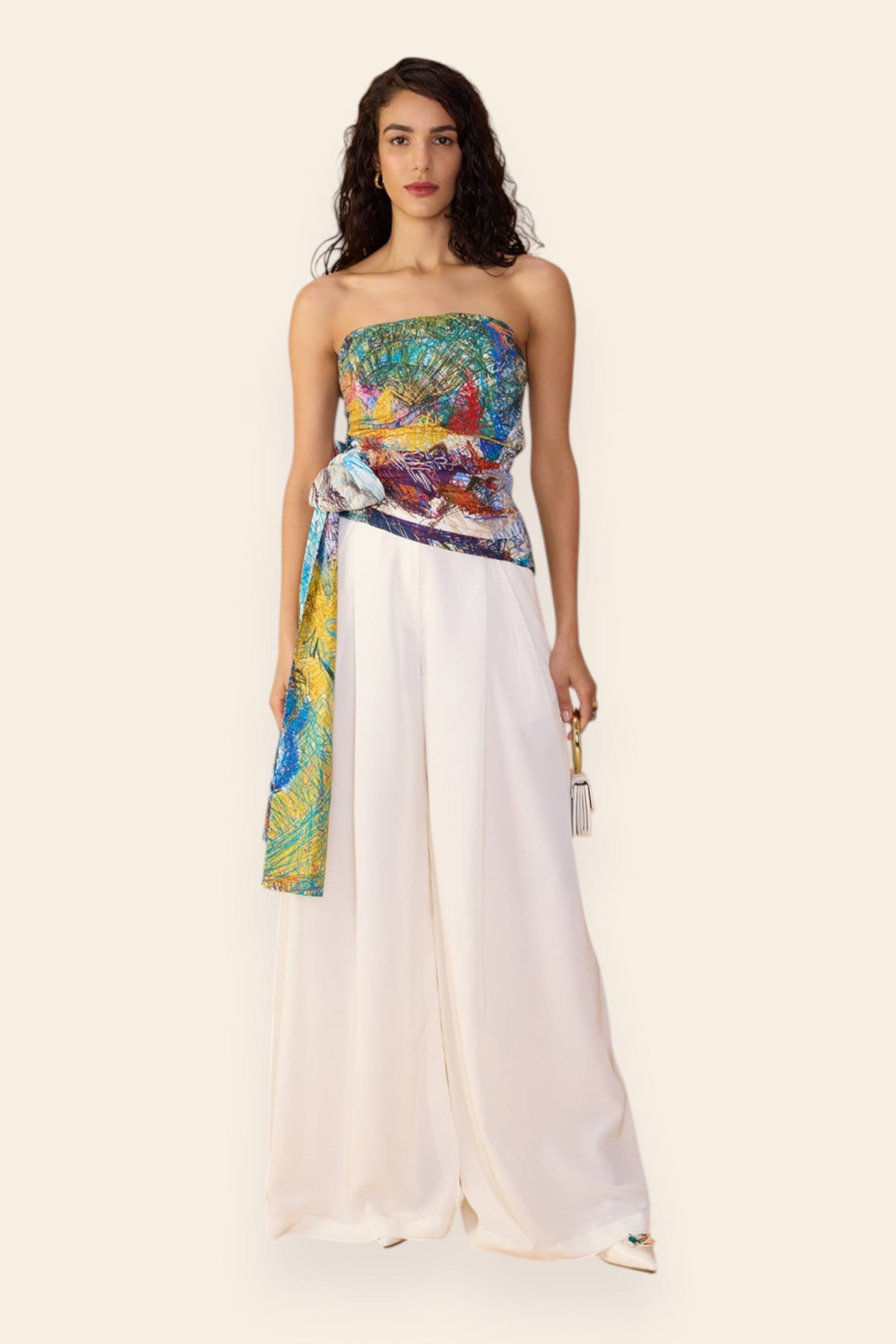 Saaksha & Kinni abstract print strapless blouse and white wide-leg palazzo set, front view
