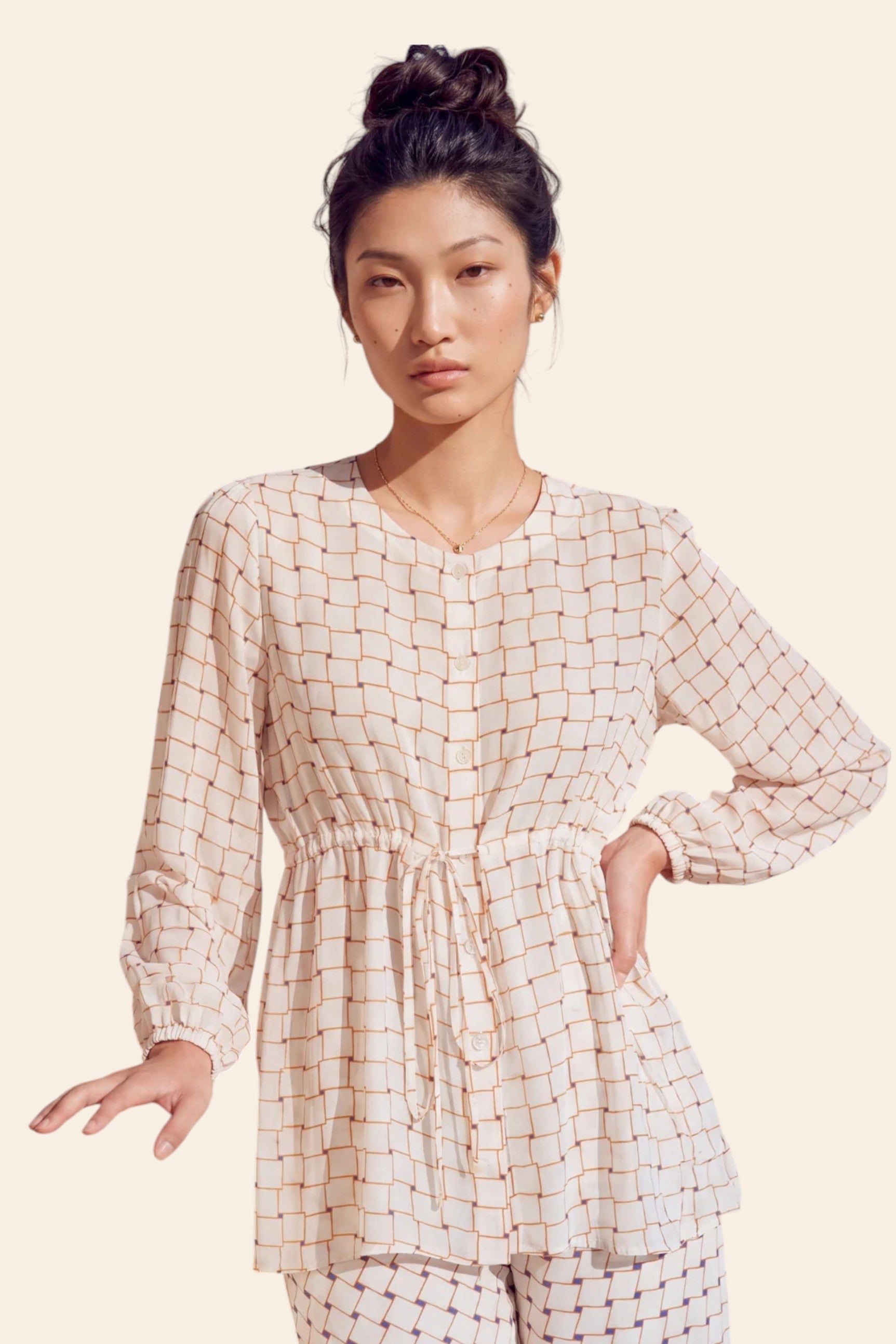Nautanky ivory printed blouse with softly gathered bodice, styling detail