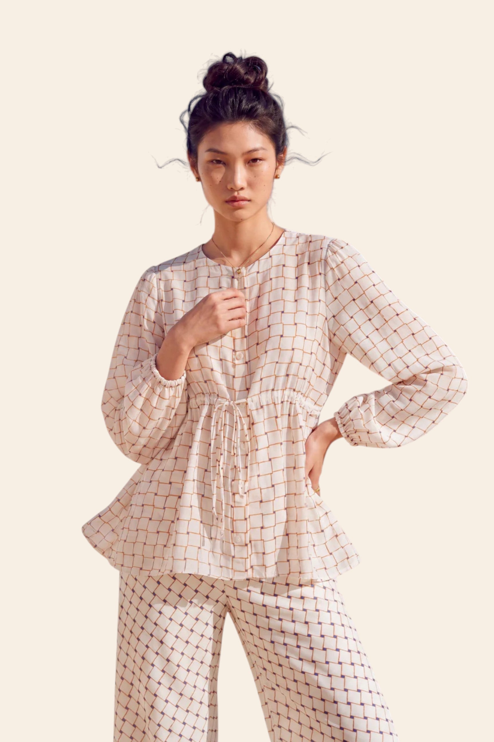 Ivory dune print blouse and straight-leg pants in natural crepe, side view