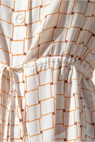 Ivory printed straight-fit pants by Nautanky, drape and leg line detail